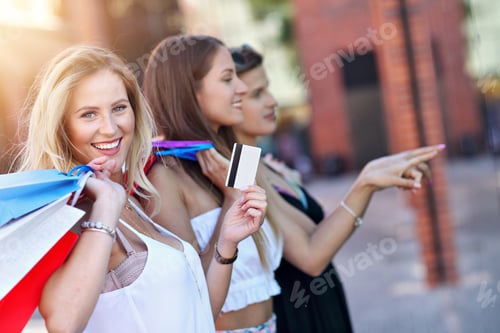 Preview: Happy Girl Friends Shopping In Mall