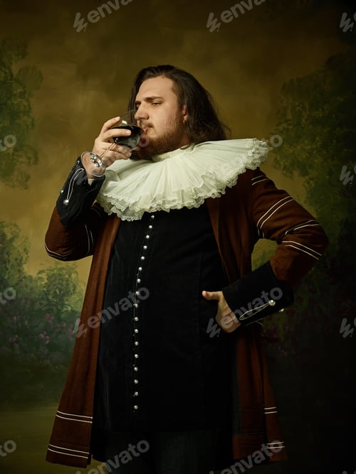 Preview: Young Man As A Medieval Knight On Dark Studio Background. Portrait In Low Key Of Male Model In