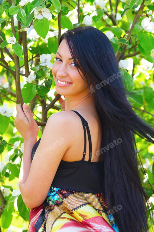 Preview: Young Hispanic Woman In The Garden
