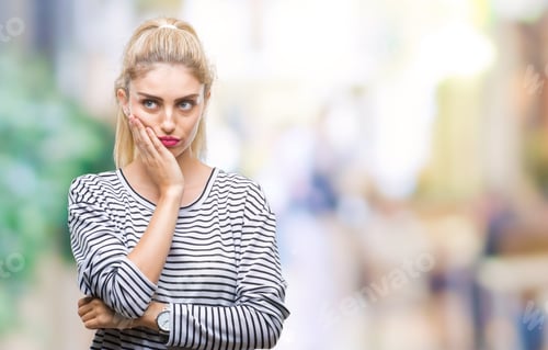 Preview: Young Beautiful Blonde Woman Wearing Stripes Sweater Over Isolated Background Thinking Looking
