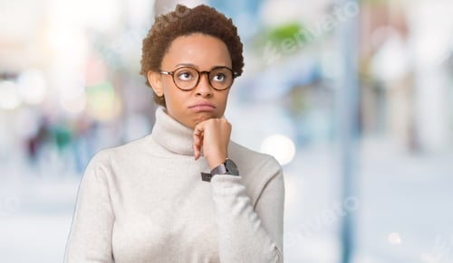 Preview: Young Beautiful African American Woman Wearing Glasses Over Isolated Background Thinking Looking