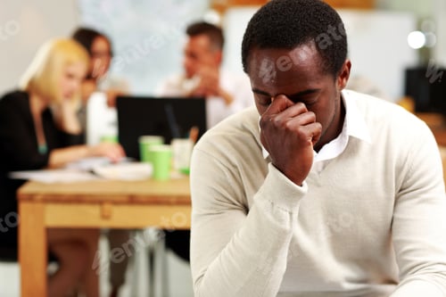Preview: African American Businessman Tired In Office