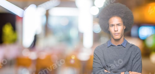 Preview: Young African American Business Man With Afro Hair Skeptic And Nervous, Disapproving Expression On