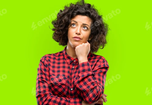 Preview: Beautiful Arab Woman Thinking And Looking Up Expressing Doubt And Wonder