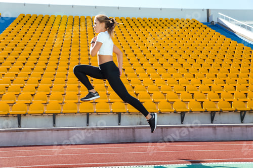 Preview: Portrait Of A Fitness Woman Running At Stadium