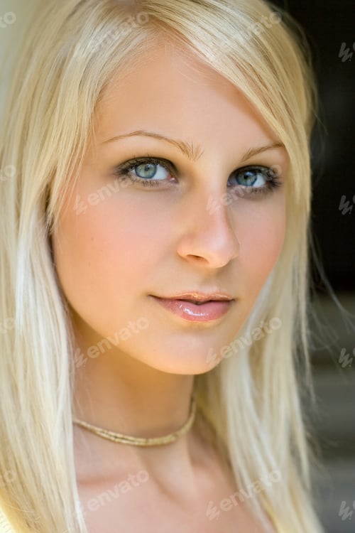 Preview: Soft Light Closeup Portrait Of Beautiful Young Blond Girl.