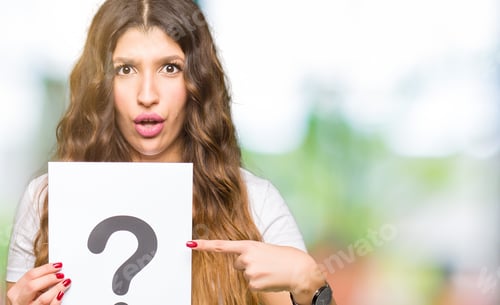 Preview: Young Adult Woman Holding Paper With Question Mark Very Happy Pointing With Hand And Finger