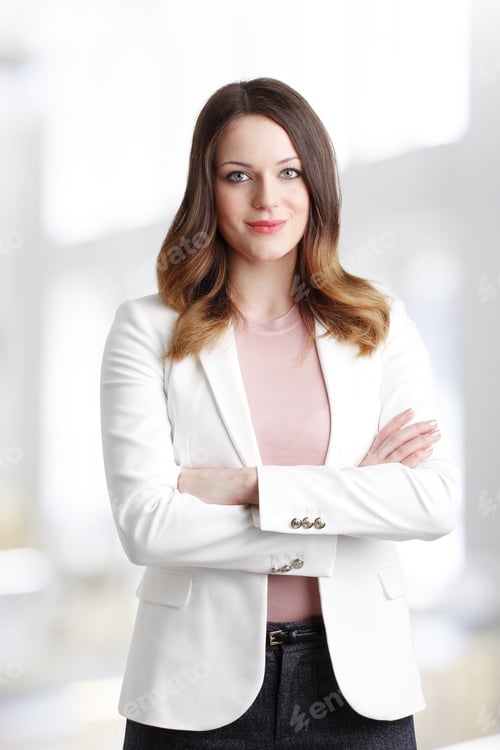 Preview: Portrait Of Beautiful Young Businesswoman Standing At Office While Looking At Camera And Smiling.