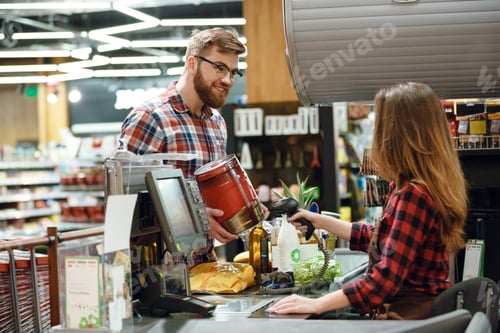 Preview: Photo Of Happy Young Man Standing Near Cashier'S Desk In Supermarket Shop With Beer. Looking Aside.