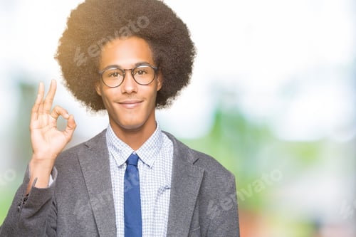 Preview: Young African American Business Man With Afro Hair Wearing Glasses Smiling Positive Doing Ok Sign
