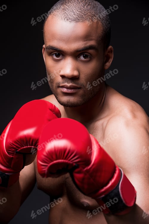 Preview: I Am Ready To Fight! Young Shirtless African Man In Boxing Gloves Preparing To Fight While Standing