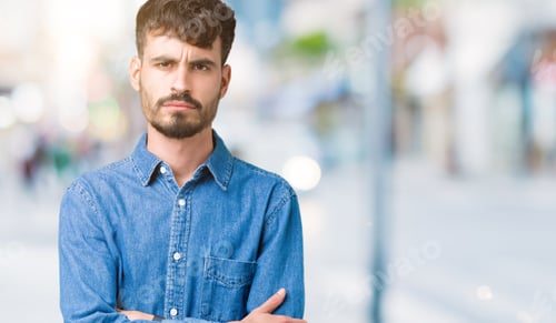 Preview: Young Handsome Man Over Isolated Background Skeptic And Nervous, Disapproving Expression On Face