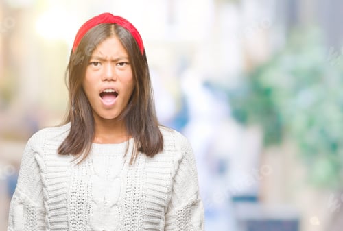 Preview: Young Asian Woman Wearing Winter Sweater Over Isolated Background Afraid And Shocked With Surprise