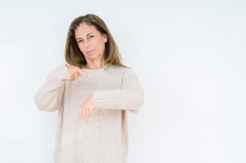 Preview: Beautiful Middle Age Woman Over Isolated Background In Hurry Pointing To Watch Time, Impatience