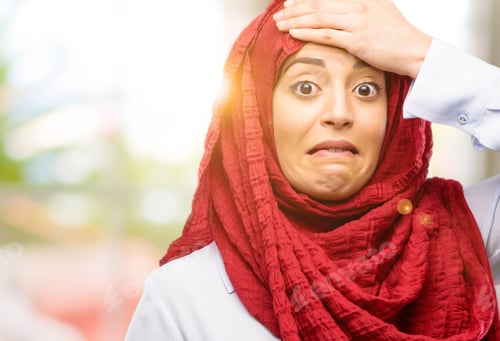 Preview: Young Arab Woman Wearing Hijab Terrified And Nervous Expressing Anxiety And Panic Gesture
