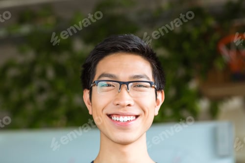 Preview: Closeup Portrait Of Asian Positive Cheerful Young Man In Glasses