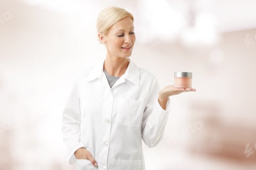 Preview: Portrait Of Beauty Specialist Standing At Beauty Salon And Holding In Her Hand A Bowl Of Cream.