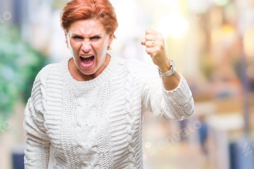 Preview: Atrractive Senior Caucasian Redhead Woman Wearing Winter Sweater Over Isolated Background Angry And