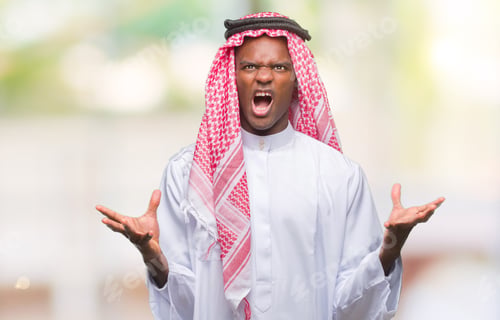 Preview: Young Arabic African Man Wearing Traditional Keffiyeh Over Isolated Background Crazy And Mad