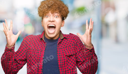Preview: Young Handsome Student Man With Afro Hair Wearing A Jacket Celebrating Crazy And Amazed For Success