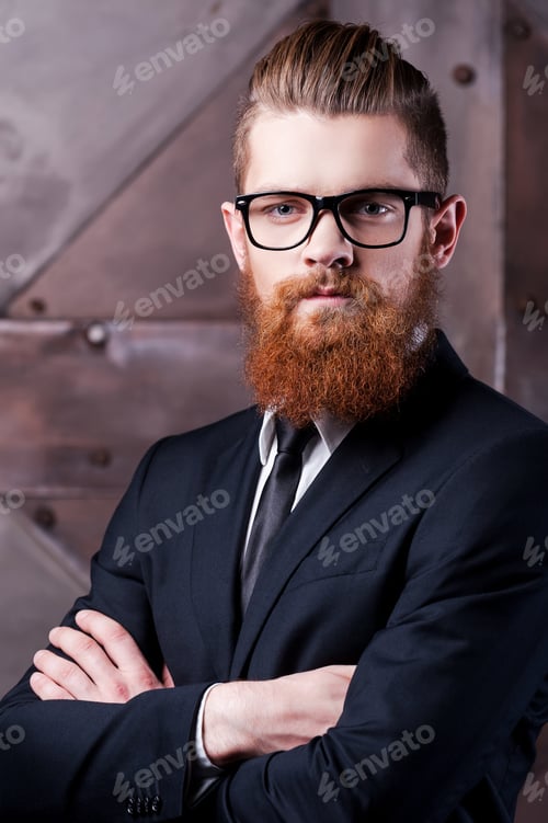 Preview: Young And Confident. Portrait Of Handsome Young Man In Formalwear Looking At Camera And Keeping