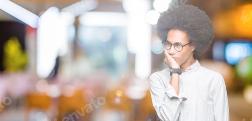 Preview: Young African American Man With Afro Hair Wearing Glasses Thinking Looking Tired And Bored With