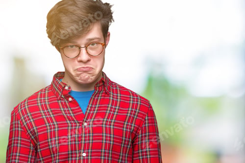 Preview: Young Handsome Man Wearing Glasses Over Isolated Background Depressed And Worry For Distress