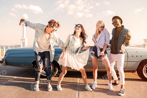 Preview: Group Of Cheerful Young Friends Dancing Together Outdoors