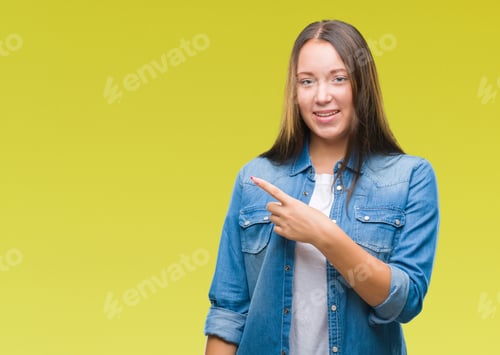 Preview: Young Caucasian Beautiful Woman Over Isolated Background Cheerful With A Smile Of Face Pointing