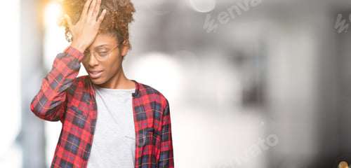 Preview: Beautiful Young African American Woman Wearing Glasses Over Isolated Background Surprised With Hand