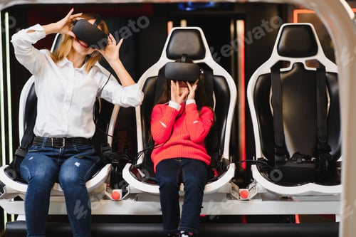 Preview: Mother And Child Playing Together With Virtual Reality Headsets
