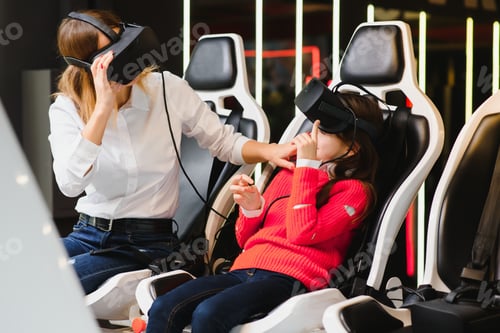 Preview: Family, Technology And Virtual Reality Concept - Mother And Daughter In Vr Glasses