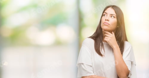 Preview: Young Beautiful Hispanic Woman Serious Face Thinking About Question, Very Confused Idea