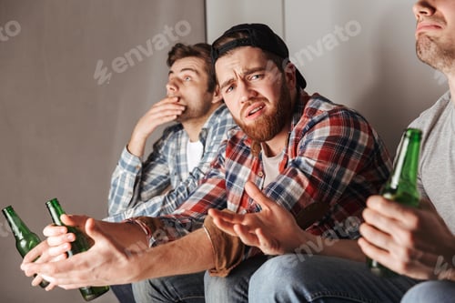 Preview: Photo Of Crushed Guys Expressing Frustration And Dissatisfaction While Watching Football Game In