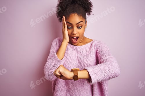 Preview: Young African American Woman Wearing Winter Sweater Standing Over Isolated Pink Background Looking