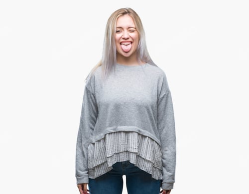 Preview: Young Blonde Woman Over Isolated Background Sticking Tongue Out Happy With Funny Expression