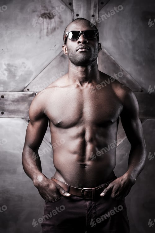 Preview: Confident Handsome. Handsome Young Shirtless African Man In Sunglasses Holding Hands In Pockets