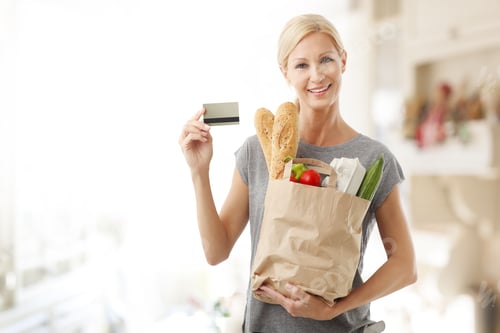 Preview: Portrait Of Smiling Shopping Woman Paying By Card At The Supermarket.