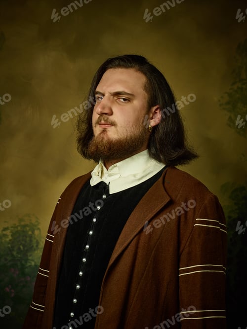 Preview: Young Man As A Medieval Knight On Dark Studio Background. Portrait In Low Key Of Male Model In