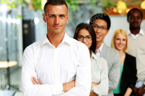 Preview: Happy Group Of Business People In The Office Lined Up