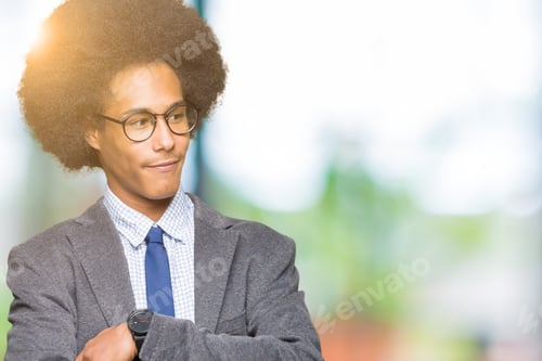 Preview: Young Man in Suit Jacket Checking His Watch