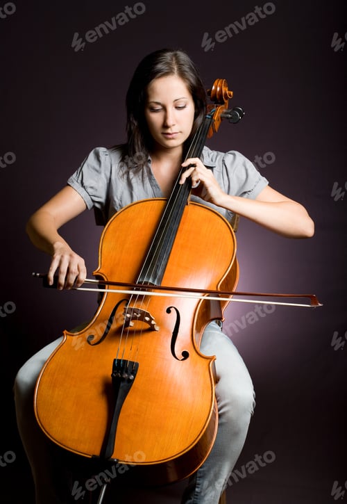 Preview: Portrait Of Beautiful Young Cellist Immersed Passionate In Her Music.