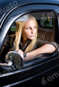 Preview: Beautiful Young Blonde Posing With Black Vintage Car.
