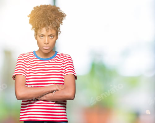 Preview: Beautiful Young African American Woman Over Isolated Background Skeptic And Nervous, Disapproving