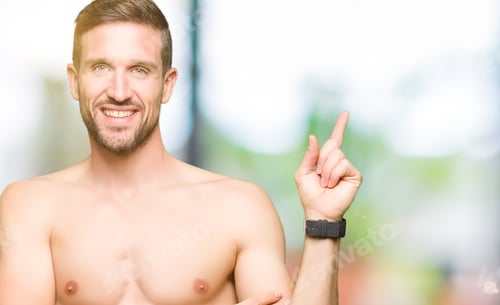 Preview: Handsome Shirtless Man Showing Nude Chest With A Big Smile On Face, Pointing With Hand And Finger