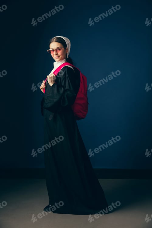 Preview: Back To School For New Emotions. Medieval Young Woman As A Nun In Vintage Clothing, Red Sunglasses