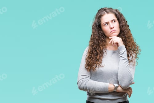 Preview: Beautiful Brunette Curly Hair Young Girl Wearing A Sweater Over Isolated Background With Hand On