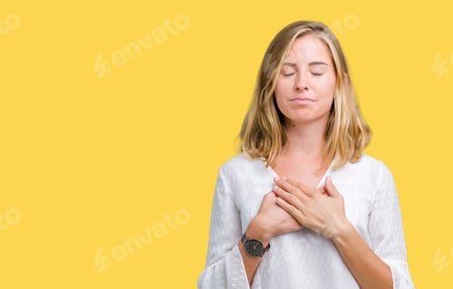 Preview: Beautiful Young Elegant Woman Over Isolated Background Smiling With Hands On Chest With Closed Eyes