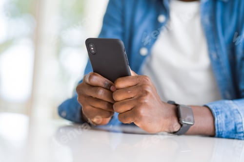 Preview: Close Up Of African Man Hands Using Smarpthone
