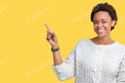 Preview: Beautiful Young African American Woman Wearing Sweater Over Isolated Background With A Big Smile On